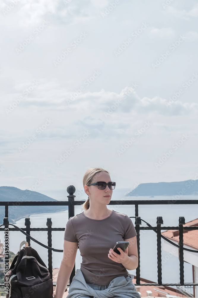 Obraz premium ourney, young woman embarks solo journey, middle breathtaking mountain panorama. Embracing self-care digital nomad lifestyle, freedom, adventure and personal growth