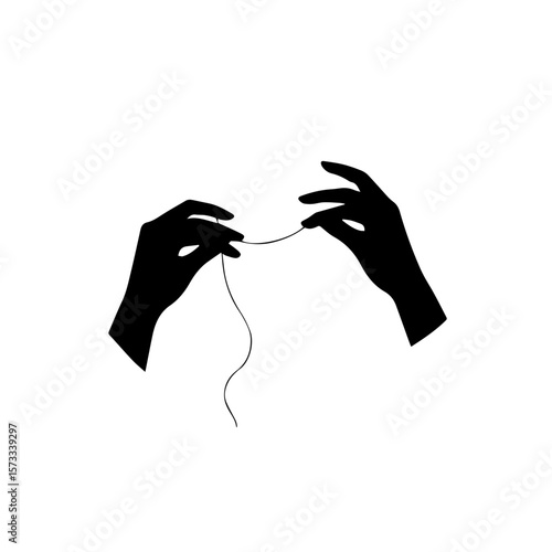 Silhouette hand holding thread with needle creates focus on craftsmanship. Craftsmanship embodies artful needlework, representing patience and detail, showing silhouette hand holding thread.