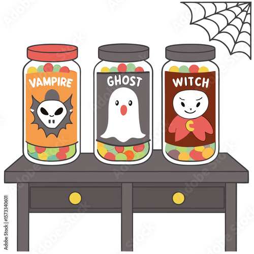 Three halloween themed candy jars with vampire ghost and witch labels sitting on a dark gray table top surface