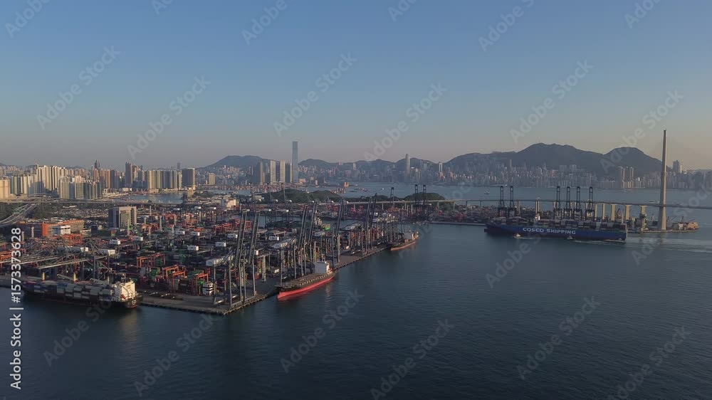 Aerial view of busy shipping port with ships and colorful containers at sunset, Hong Kong, 4k Aerial view of busy shipping port with ships and colorful containers at sunset, Hong Kong, 4k