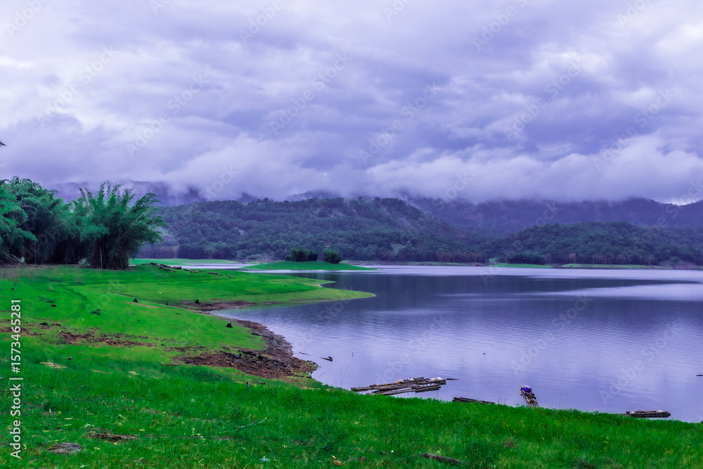 Fototapeta premium beautiful landscape scenery with lake and green forest mountain in kerala