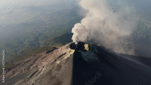 fire volcano with smoke in guatemala