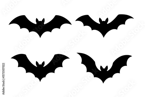 Set of four black bat silhouettes. Spooky Halloween vector illustration. Scary flying nocturnal mammal creature icon. Gothic horror design element for party decoration.