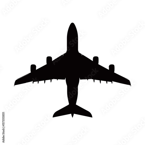 Overhead view of a large airplane with four engines and wings extended in a symmetrical design image