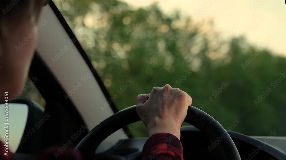 custom made wallpaper toronto digitalWoman is driving a car and looking out the window. The car is parked in a parking lot