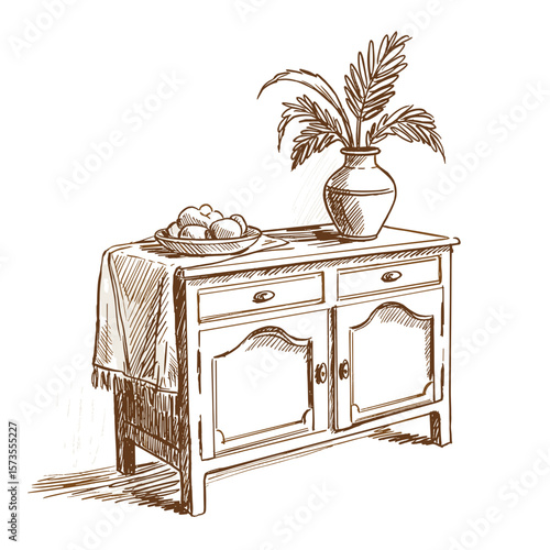 Vintage commode with textile tablecloth and vase of flowers  