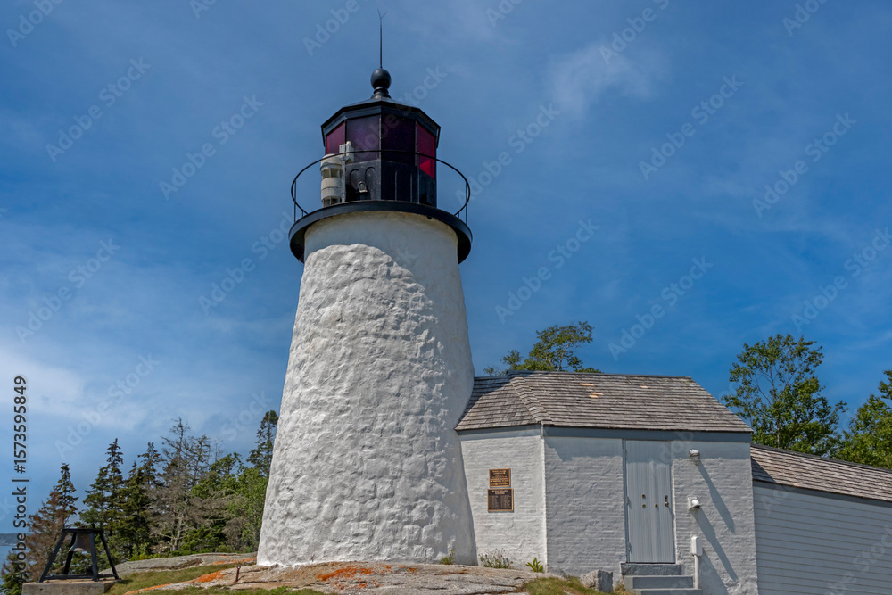 Burnt Island Lighthouse in Boothbay Harbor Maine USA on a bright summer morning Burnt Island Lighthouse in Boothbay Harbor Maine USA on a bright summer morning