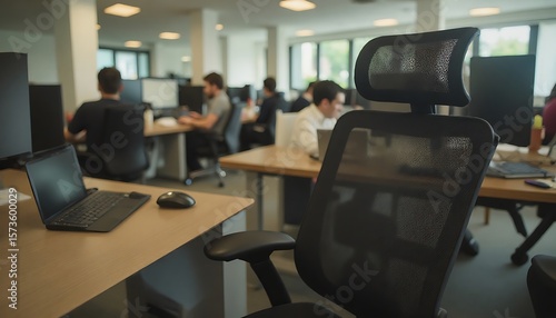 Office scene with computer, mouse, and ergonomic mesh office chair