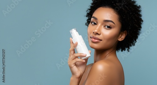Beautiful Black Woman Holding Skincare Product, Beauty Portrait
