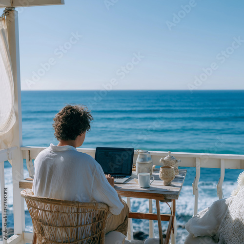 Digital Nomad Working on Laptop Near Beach