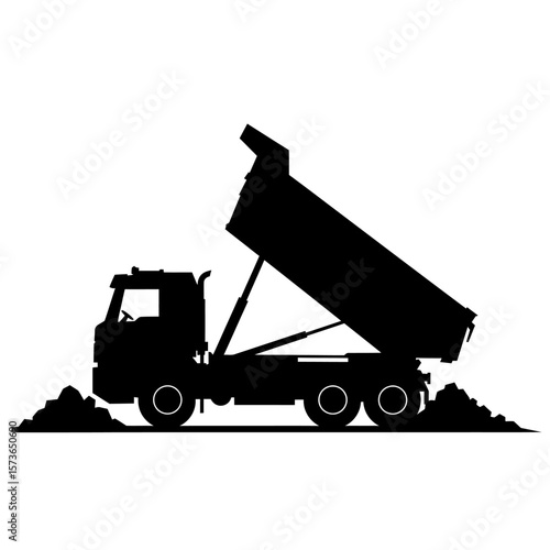 Silhouette of a dump truck raising its bed, unloading material onto the ground.