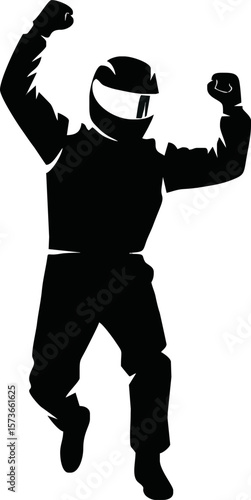 Silhouette of a triumphant motorcyclist in a celebratory jump.