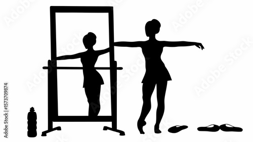 Silhouette of a ballerina practicing at the barre with a mirror and shoes and water bottle nearby