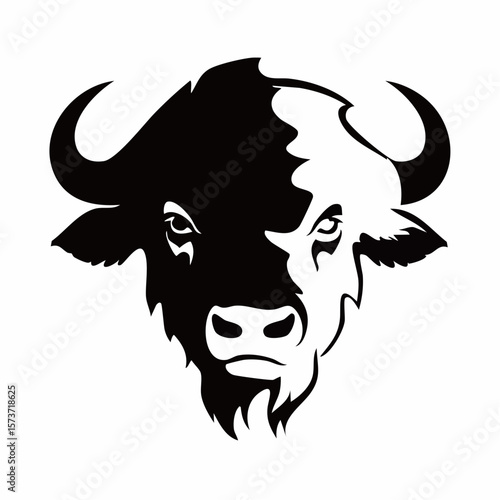 Silhouette of a buffalo's head, taken from the side, highlighting its massive horns curving outwards, with a thick