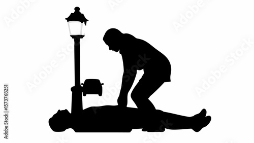 Silhouette of woman performing cpr on a man lying on the ground near a street lamp and a car shape