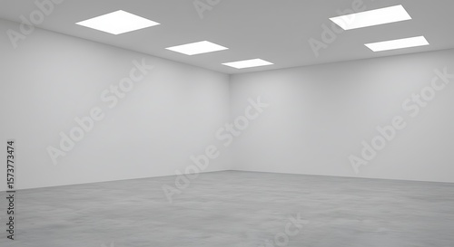 Empty White Room with Concrete Floor and Recessed Lighting