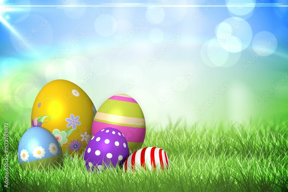 Fototapeta premium Colourful easter eggs on the grass