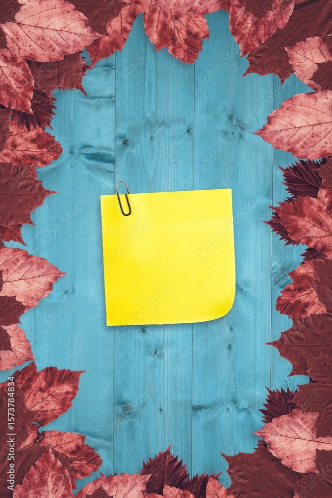 Fototapeta premium Autumn leaves with yellow note