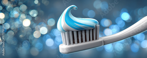 Toothbrush with colorful toothpaste against a blurred sparkling background