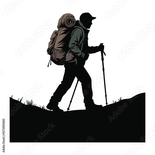 Man with backpack and trekking poles walking on a hill silhouette