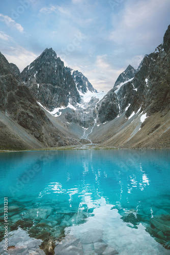 Fototapeta Naklejka Na Ścianę i Meble -  Blavatnet lake in Lyngen Alps landscape in northern Norway blue water and glacier mountains nature view travel destinations scenic view natural landmarks in Scandinavia