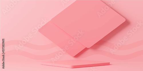 Pink ribbon on a blank pink sheet with a curled corner and soft shadow