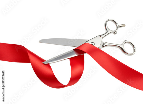 Silver scissors cutting a vibrant red ribbon isolated on transparent background