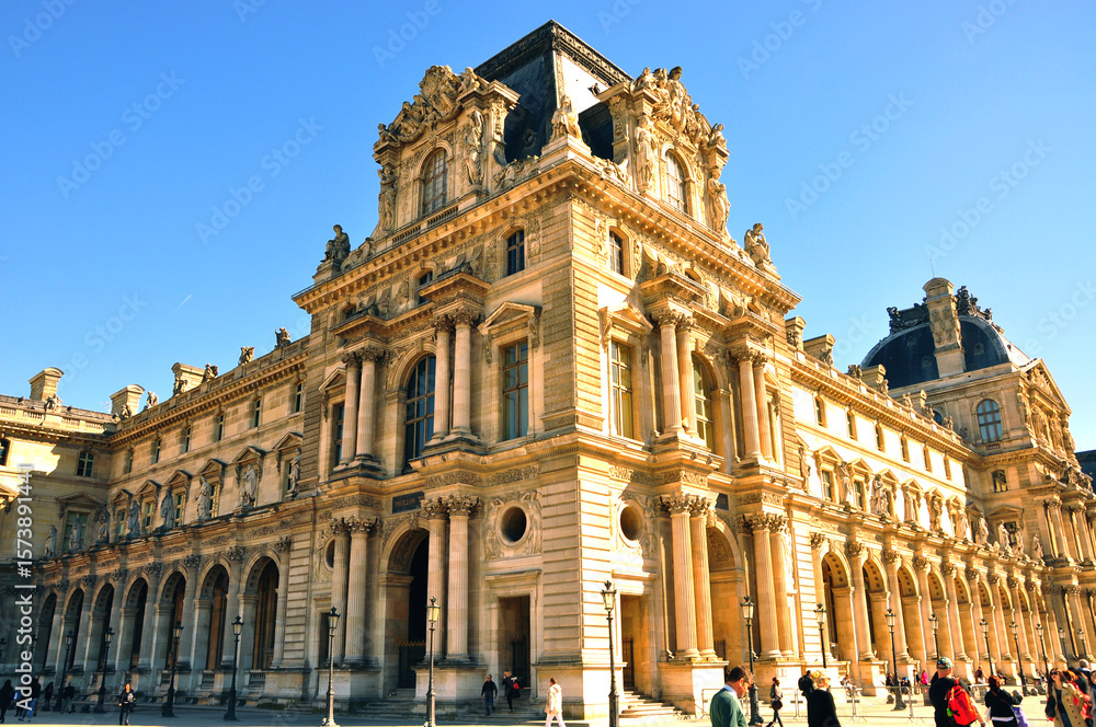 Fototapeta premium The façade of the Pavilion Mollien of the Louvre Museum in Paris, France.