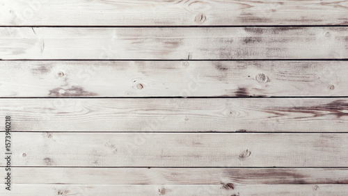 Weathered timber planks show a rich history in this aged wooden texture, perfect for rustic backdrops