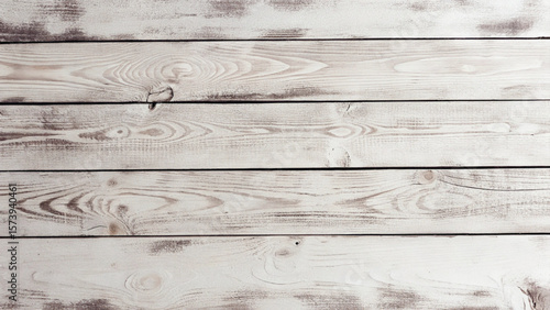 Weathered timber planks show a rich history in this aged wooden texture, perfect for rustic backdrops