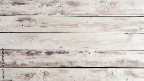 Weathered timber planks show a rich history in this aged wooden texture, perfect for rustic backdrops