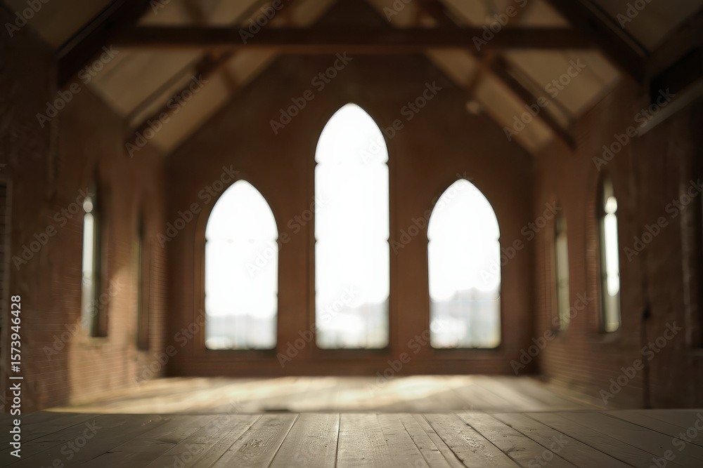 Interior view of an empty church with arched windows and wooden floor in soft focus light setting Interior view of an empty church with arched windows and wooden floor in soft focus light setting