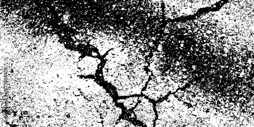 Gritty asphalt surface with scattered gravel texture background for design overlay