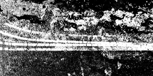 Grunge oil slick on asphalt with rainbow sheen and textured lines for design effects