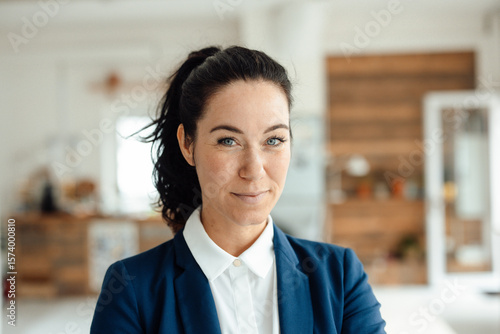 Portrait of confident brunette businesswoman