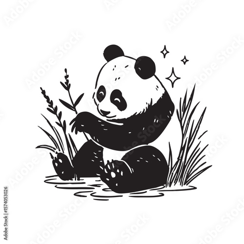 Cute panda relaxing in grass while nibbling on bamboo leaves