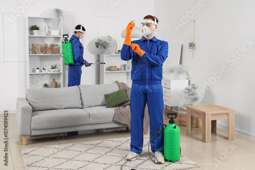 Male workers in protective ...