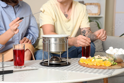 Young couple with glasses o...