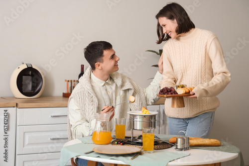 Young happy woman bringing ...