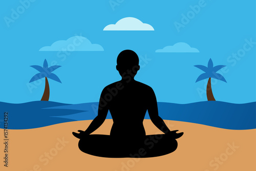 silhouette of a man meditating on the beach
