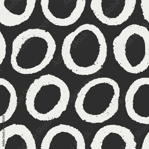 Round circles, seamless abstract pattern. Grunge-style irregular black shapes...