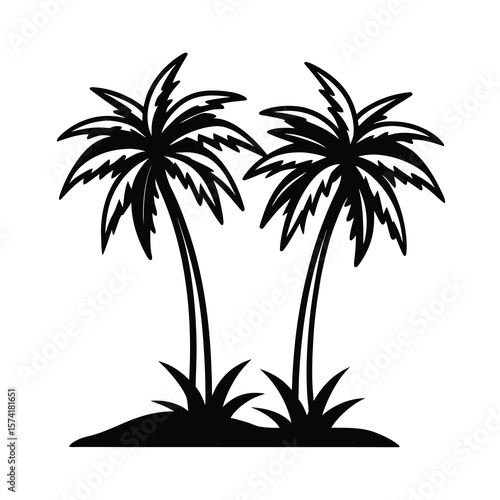 silhouette of two palm trees on grass