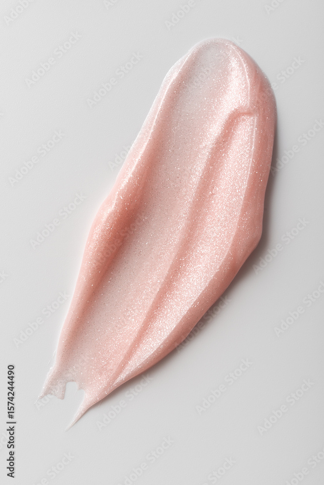 Fototapeta premium Shiny Pink Glitter Gel Swatch – Cosmetic Texture with Sparkle and Gloss on Light Background