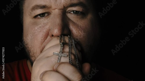 A man prays and hopes for a miracle. Pain and problems.