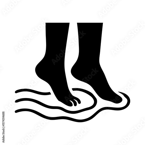 Bare feet touching flowing water for grounding and mindful connection with natural elements