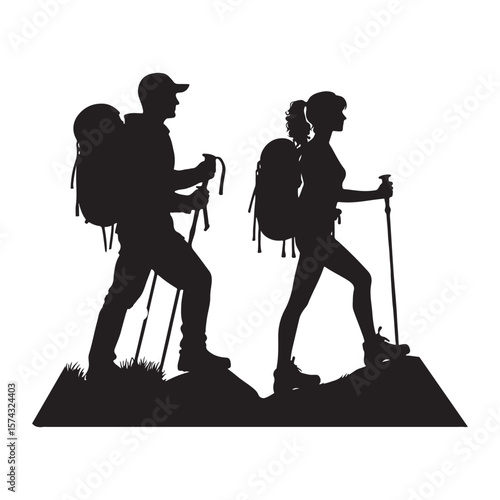 Silhouette of a man and woman hiking together with backpacks and poles