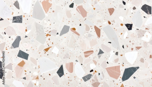 terrazzo surface pattern with scattered multicolored stone fragments on light background in decorative composite style