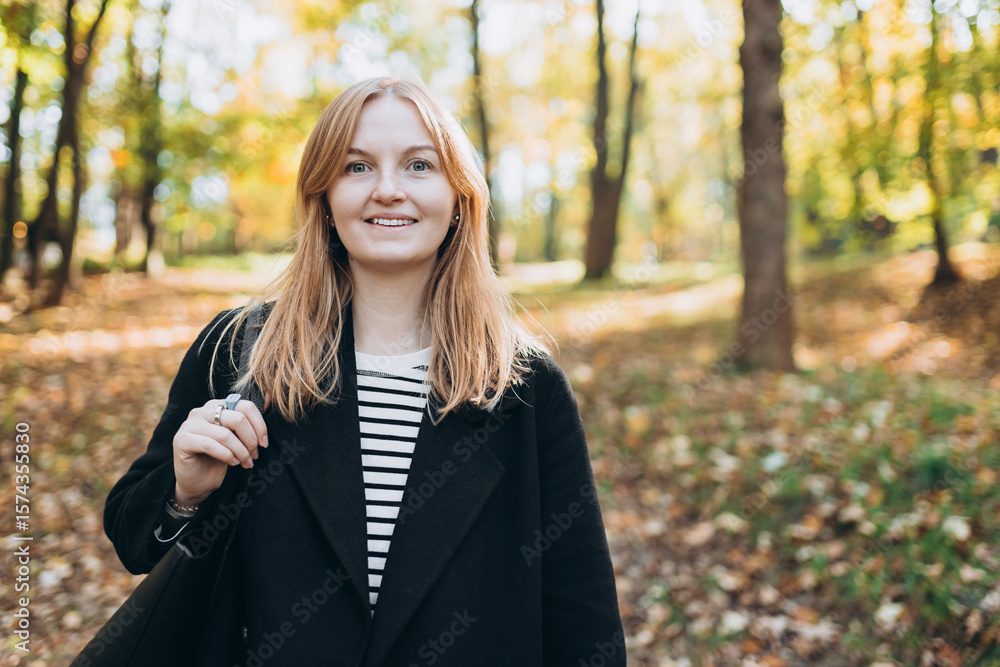 Portrait of pretty young 30s woman in evening autumn sun, smiling. Autumn landscape, calmness, tranquility concept. Pretty female on nature background. High quality photo. Portrait of pretty young 30s woman in evening autumn sun, smiling. Autumn landscape, calmness, tranquility concept. Pretty female on nature background. High quality photo.
