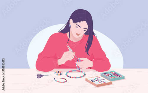 Young woman creating colorful beaded bracelets and jewelry with crafting supplies