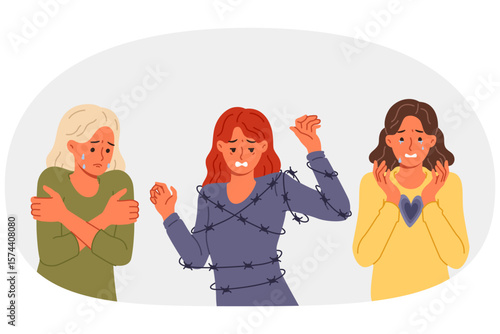 Depressed women feel pain and despair due to mental problems, shed tears and suffer because of barbed wire. Girls victims of domestic violence and discrimination need help to heal from despair